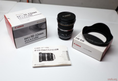With lens hood and UV filter.  Not shown: Canon LP1219 lens case.